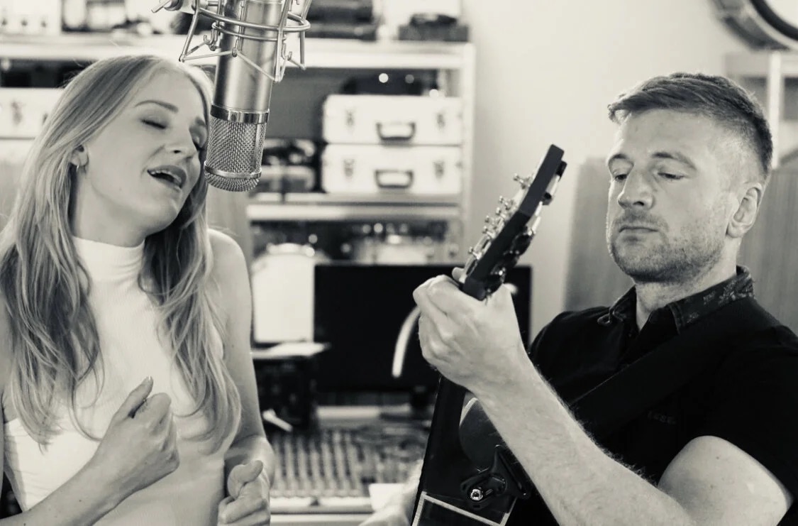 Rachel and Neil performing together in the studio